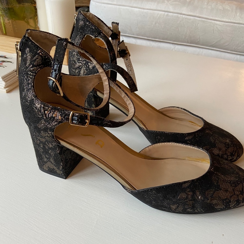Black and gold heels